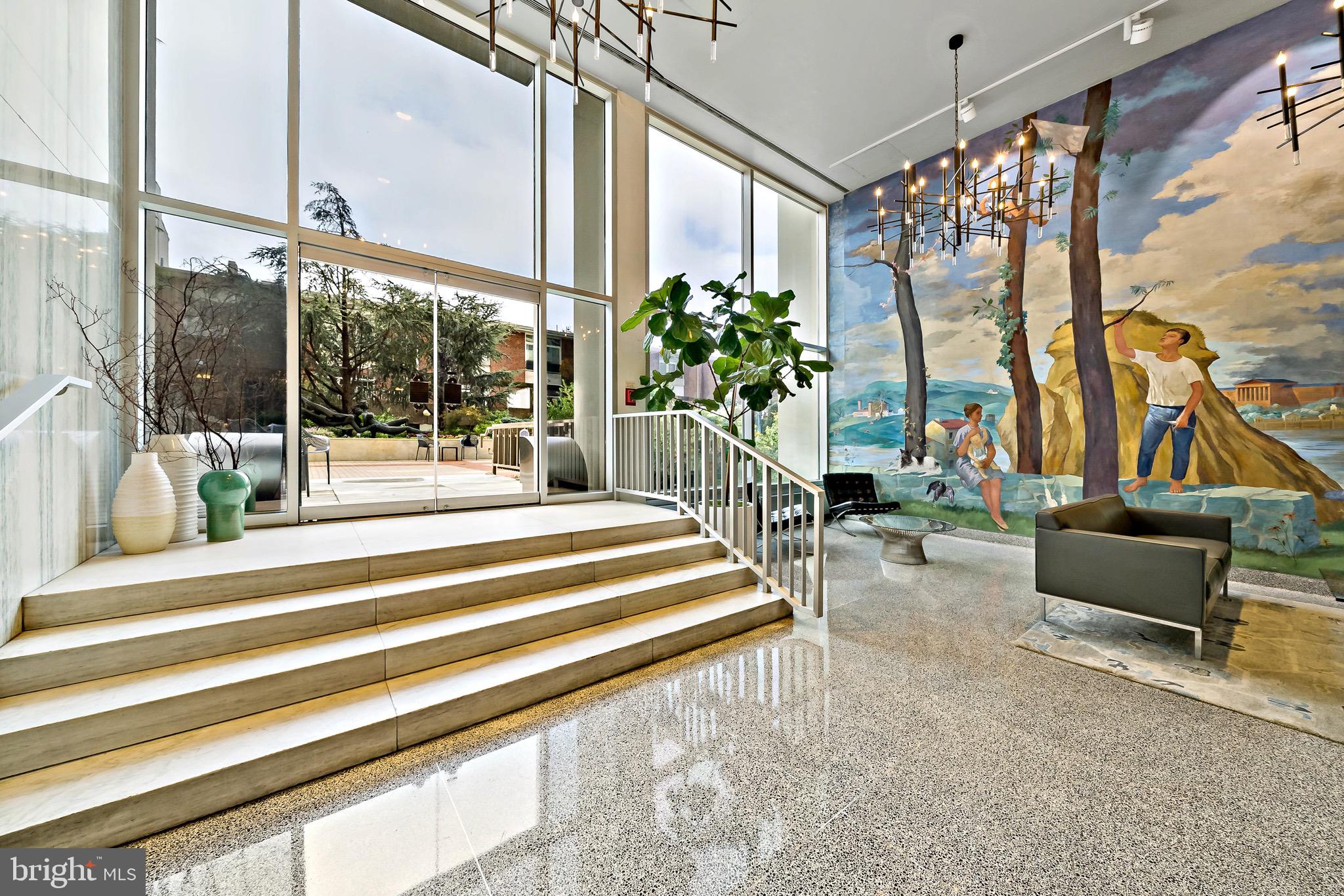 604 South Washington Square, Unit 1015 Philadelphia, PA 19106 - Photo 17 of 24 a bedroom with furniture and a large window