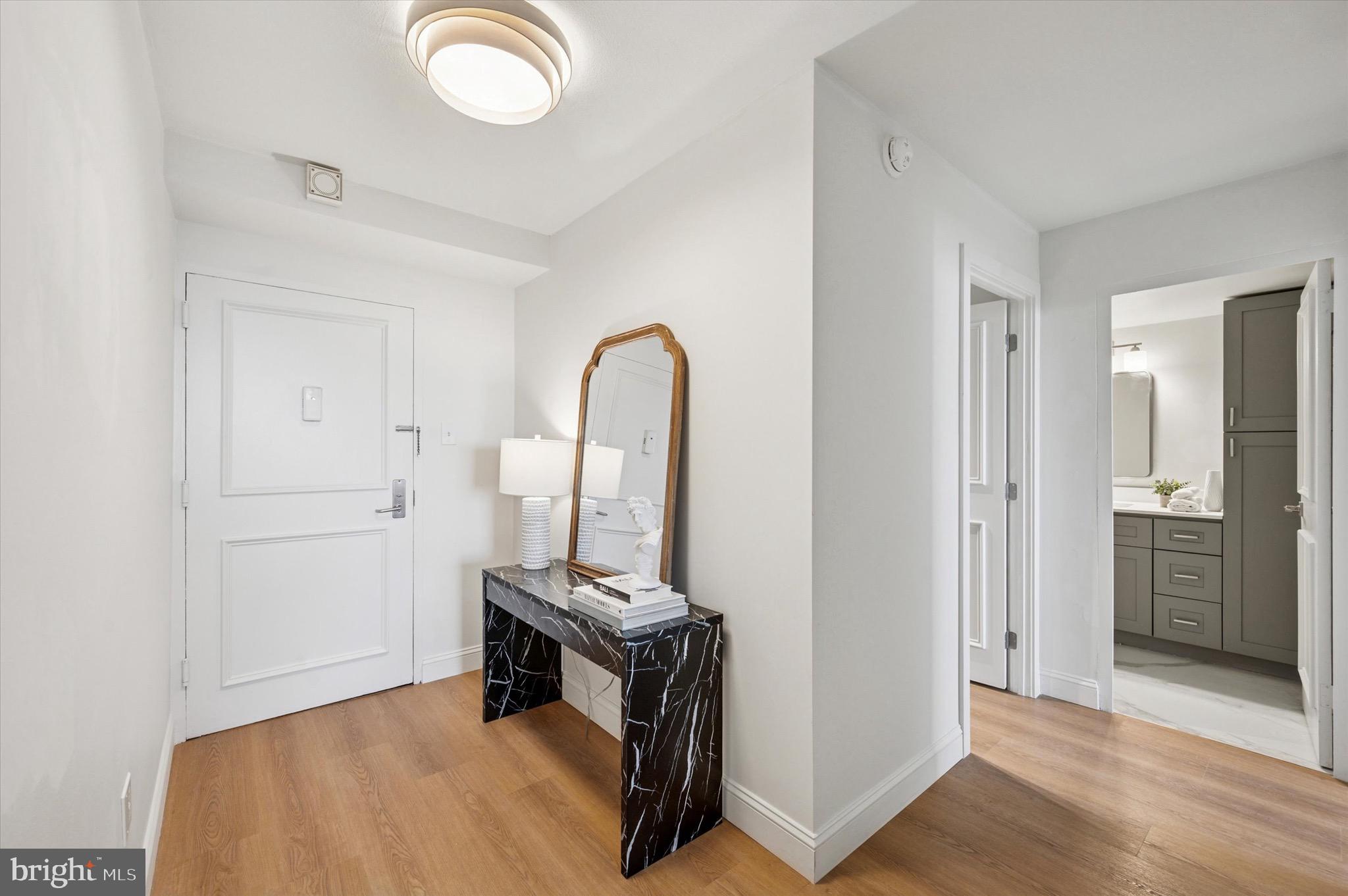 604 South Washington Square, Unit 1015 Philadelphia, PA 19106 - Photo 3 of 24 a view of room with window and wooden floor