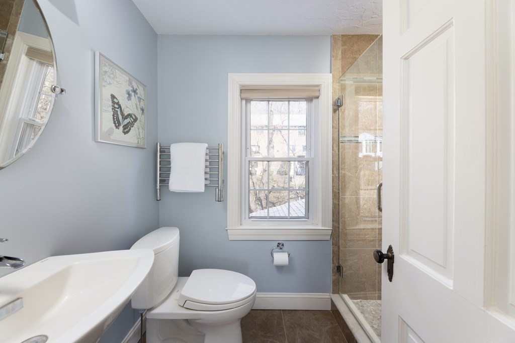 274 Beverly Road Brookline, MA 02467 - Photo 15 of 18 a white toilet sitting next to a bathroom sink