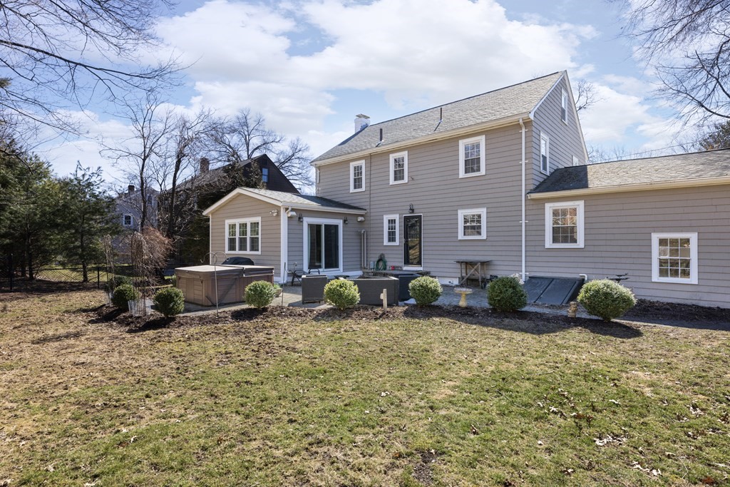 274 Beverly Road Brookline, MA 02467 - Photo 17 of 18 a front view of house with yard outdoor seating and barbeque oven