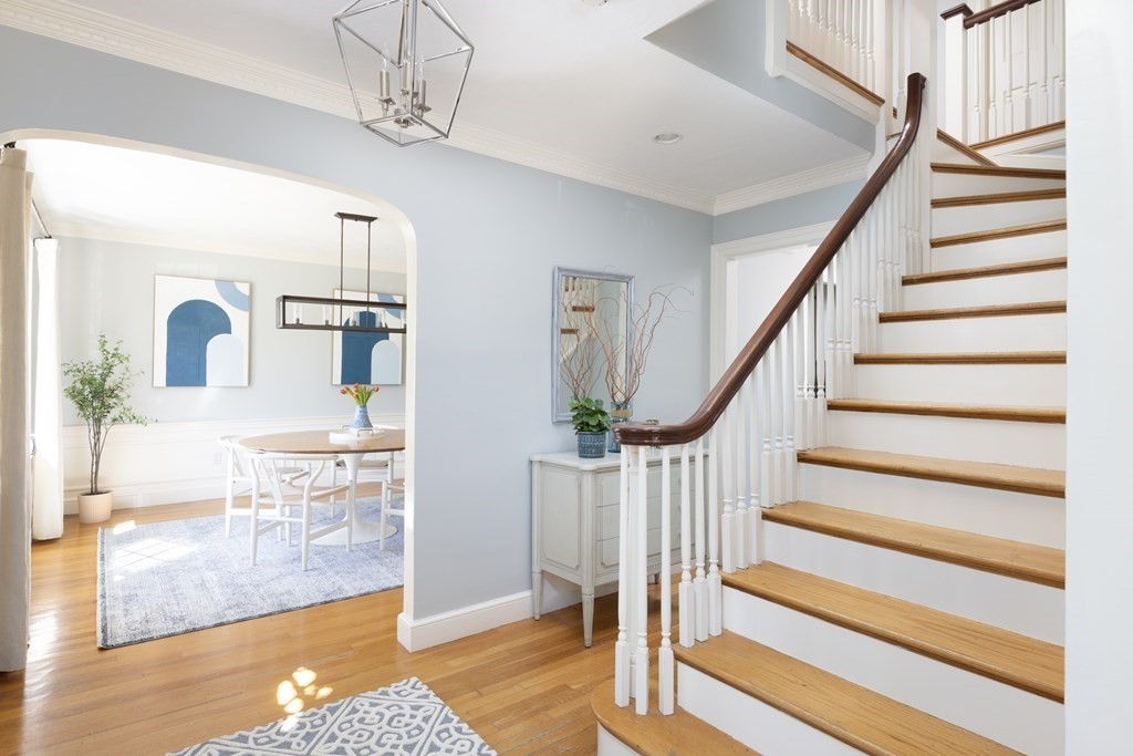 274 Beverly Road Brookline, MA 02467 - Photo 2 of 18 a view of entryway and hall with wooden floor