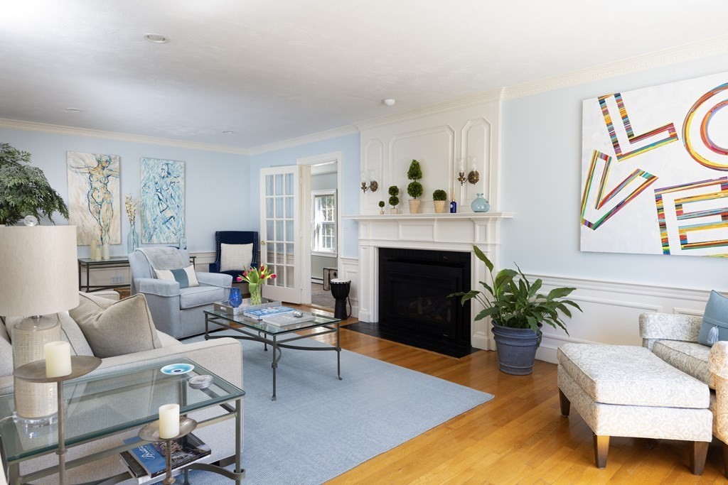 274 Beverly Road Brookline, MA 02467 - Photo 4 of 18 a living room with furniture and a fireplace