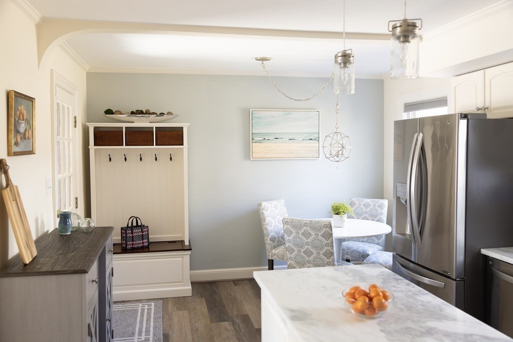 274 Beverly Road Brookline, MA 02467 - Photo 6 of 18 a living room with stainless steel appliances furniture and a refrigerator