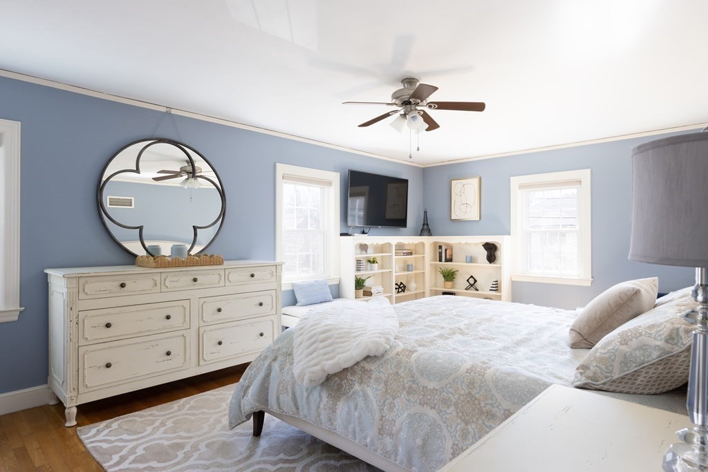 274 Beverly Road Brookline, MA 02467 - Photo 9 of 18 a bedroom with a bed and a dresser