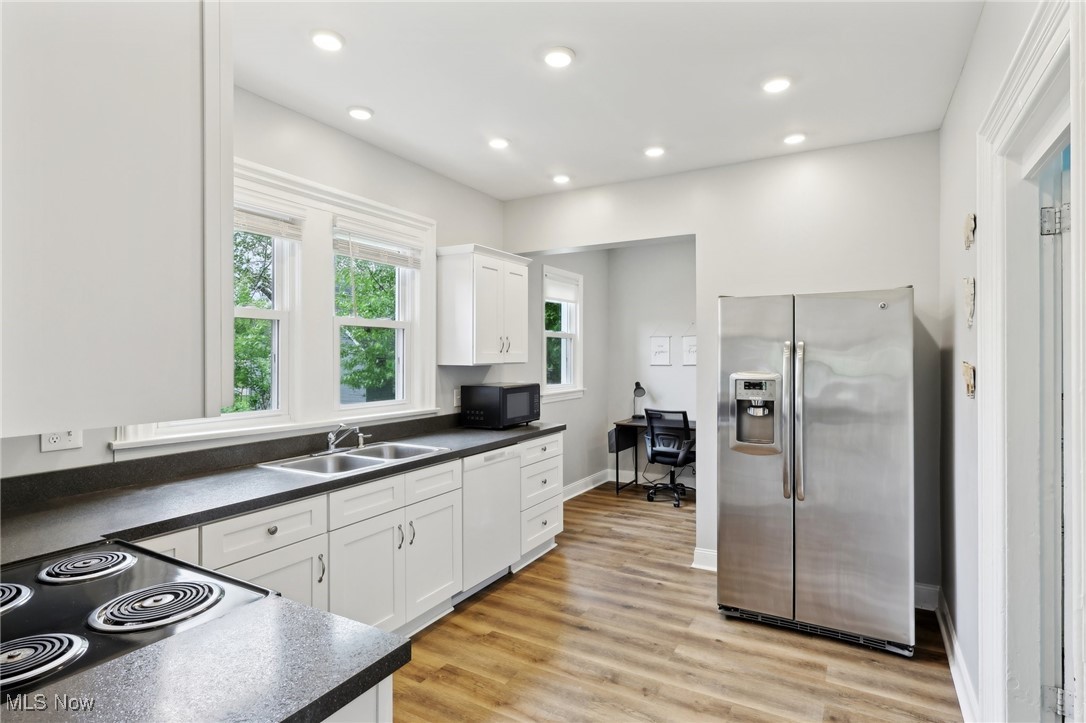 25 Taylor Road Bedford, OH 44146 - Photo 7 of 33 1st floor kitchen with ss appliances
