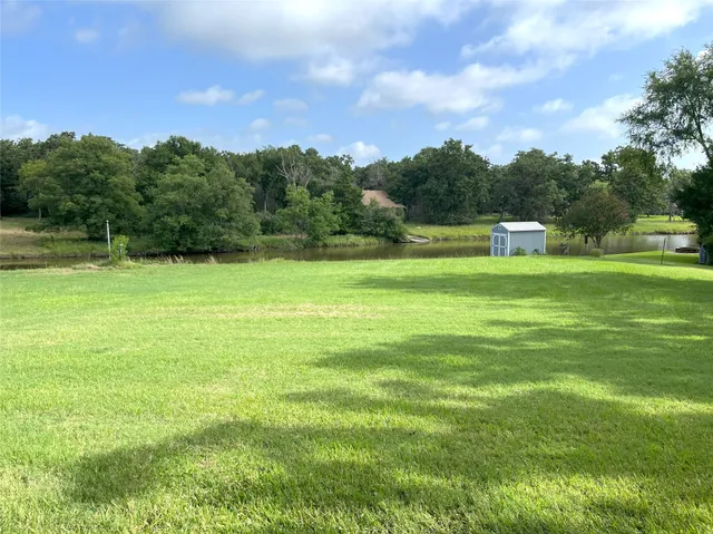 a view of a green yard