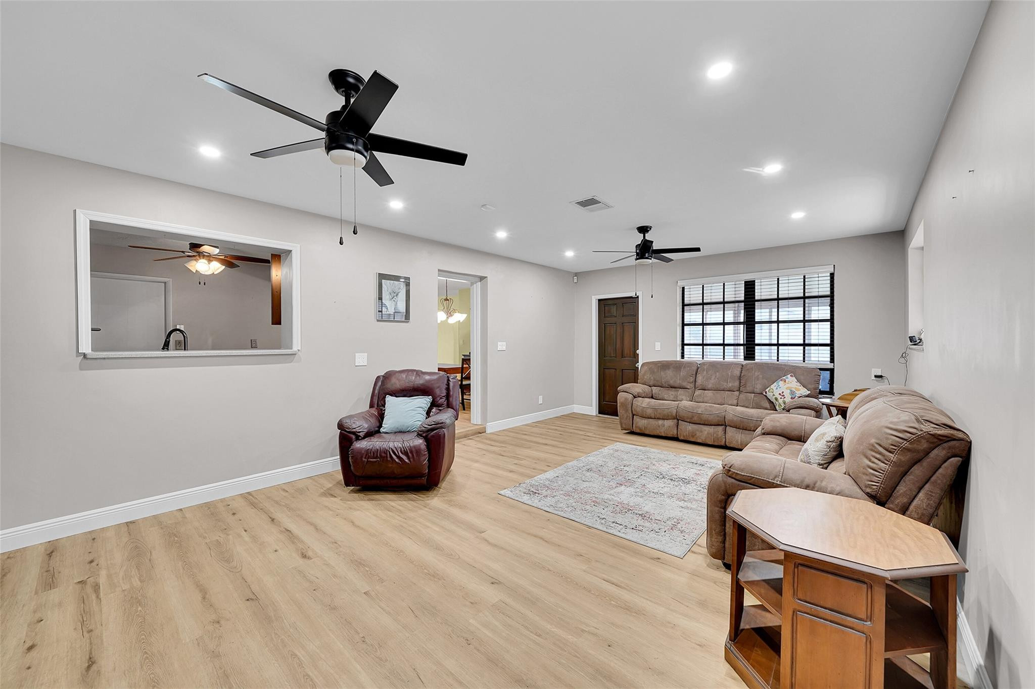 238 Southeast 3rd Street Dania Beach, FL 33004 - Photo 14 of 34 a living room with furniture and a wooden floor