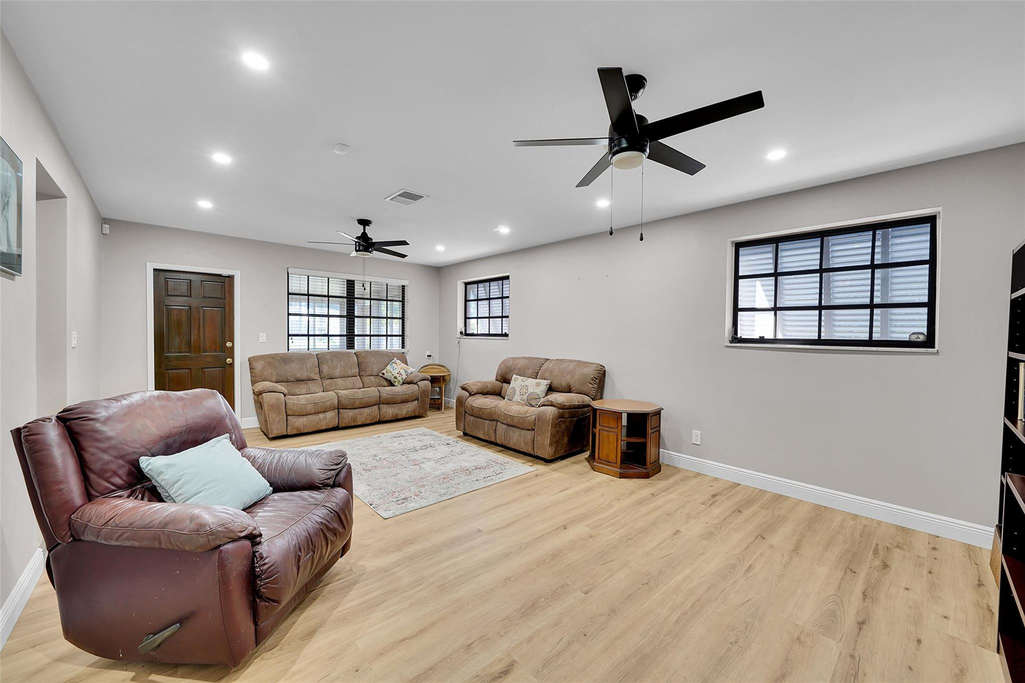 238 Southeast 3rd Street Dania Beach, FL 33004 - Photo 15 of 34 a living room with furniture or window and a wooden floor