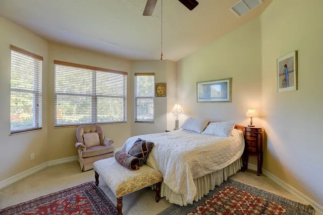 a bed room with a bed and a couch