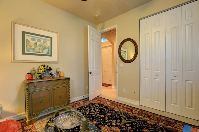 a bathroom with a sink a mirror and a toilet