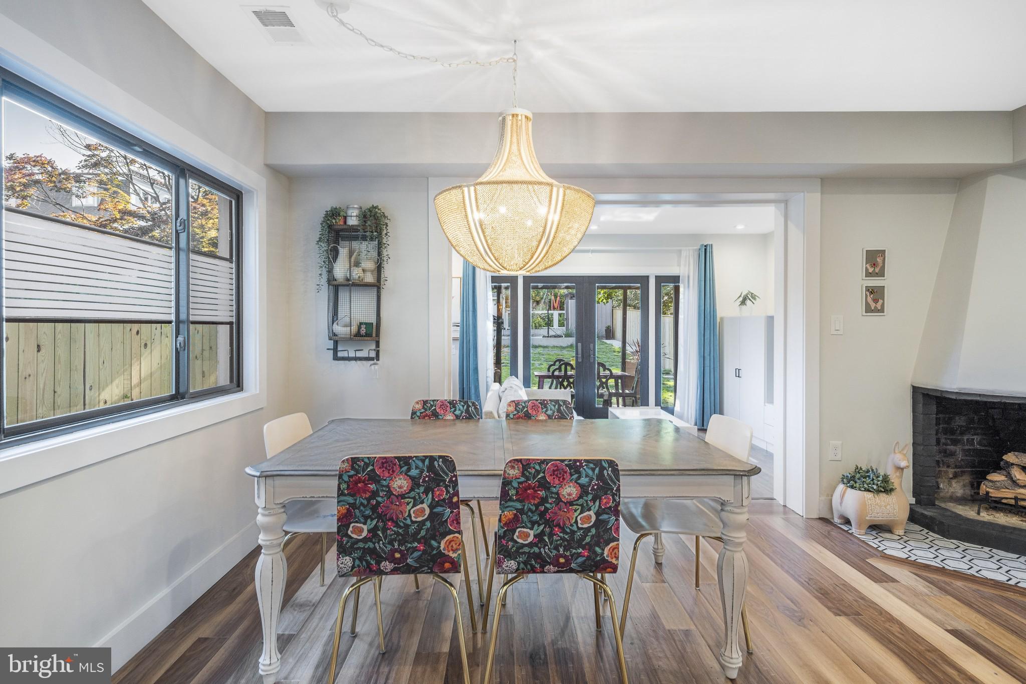 5608 39th Street Northwest Washington, DC 20015 - Photo 12 of 41 Dining open to kitchen and gas fireplace