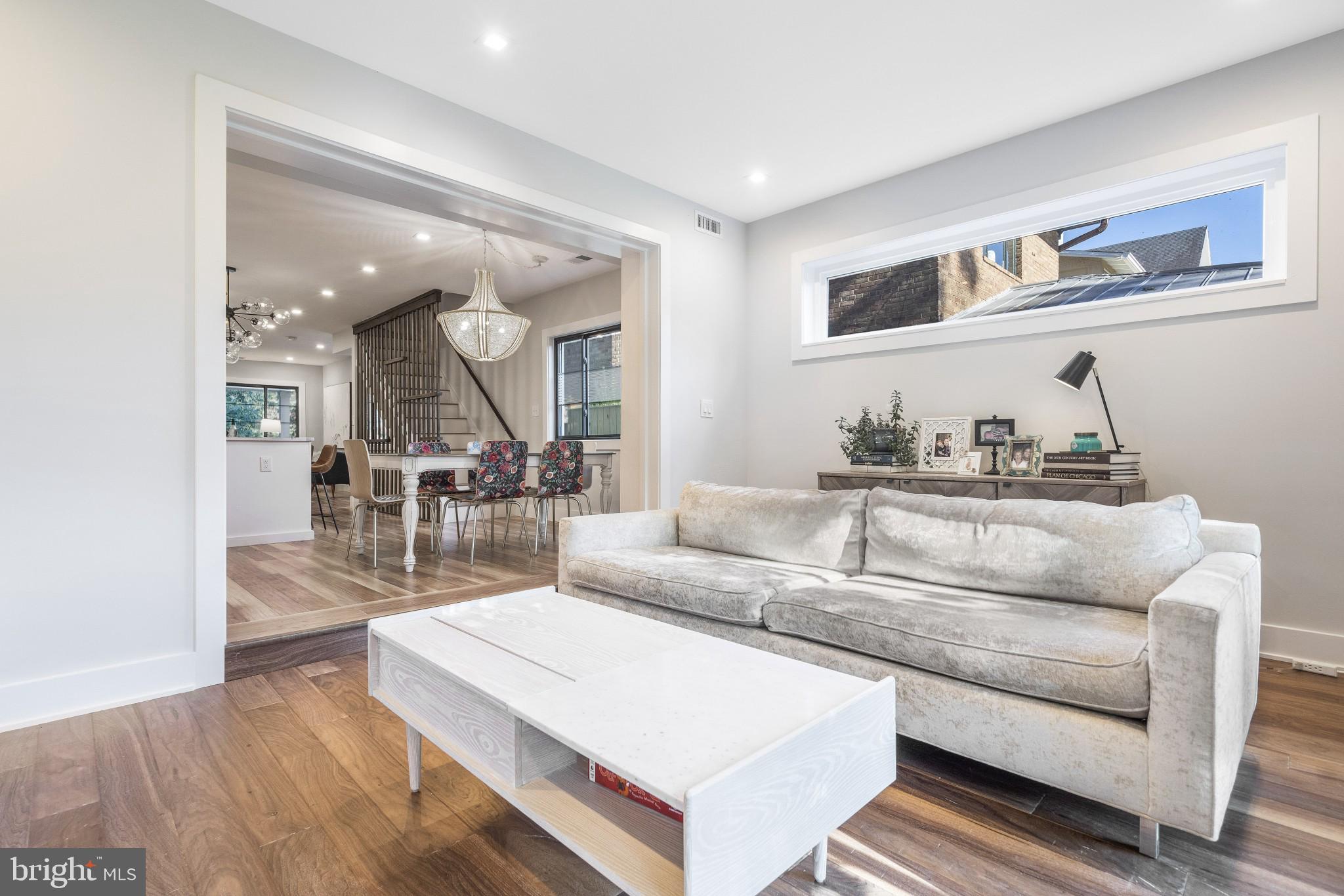 5608 39th Street Northwest Washington, DC 20015 - Photo 14 of 41 Family room with built in closets and TV stand