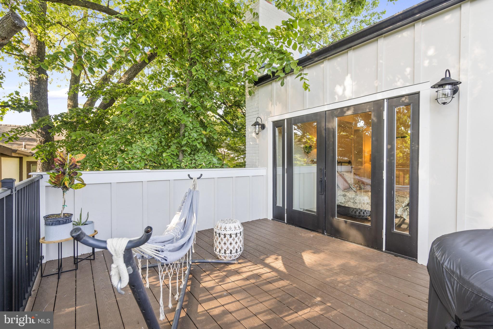 5608 39th Street Northwest Washington, DC 20015 - Photo 29 of 41 Primary suite 12x16 roof deck nestled in trees