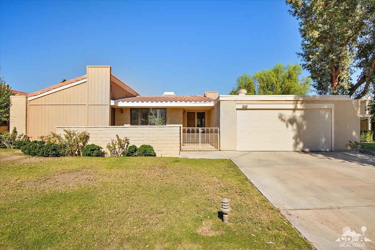 72470 Rodeo Way Rancho Mirage, CA 92270 - Photo 1 of 35 a view of a house with a garden