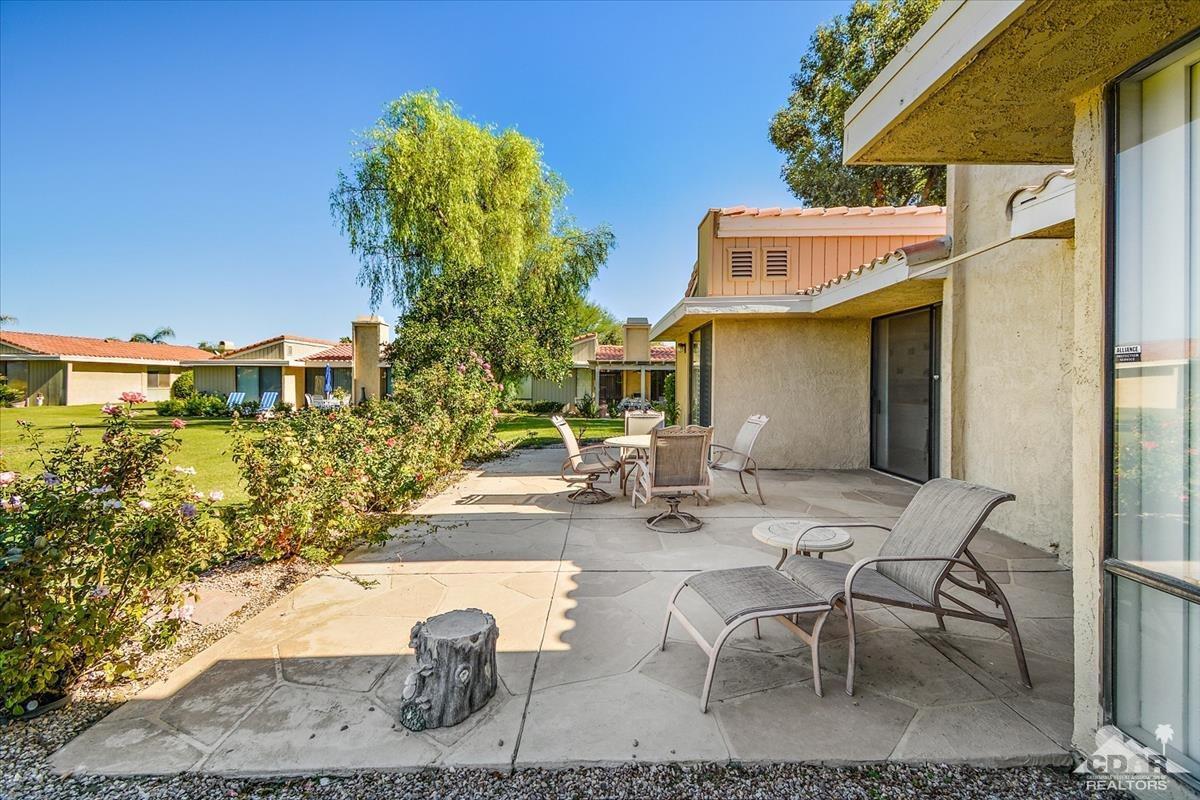 72470 Rodeo Way Rancho Mirage, CA 92270 - Photo 22 of 35 a view of a backyard with sitting area