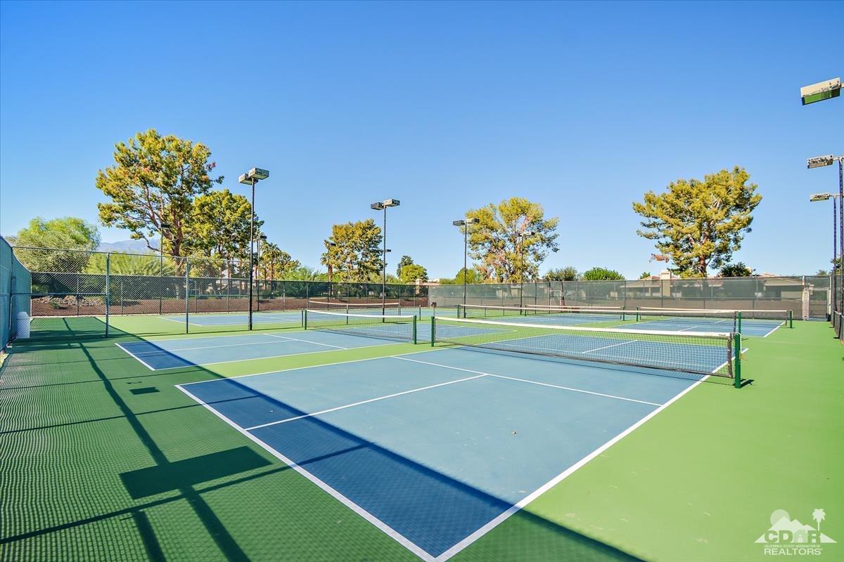 72470 Rodeo Way Rancho Mirage, CA 92270 - Photo 28 of 35 a tennis court that has trees in front of it