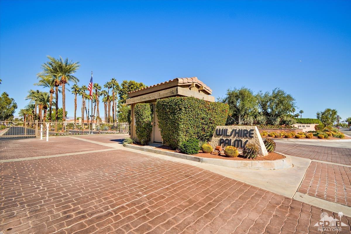 72470 Rodeo Way Rancho Mirage, CA 92270 - Photo 34 of 35 a view of a street with a cars parked in front of it