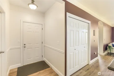 wooden floor with white walls