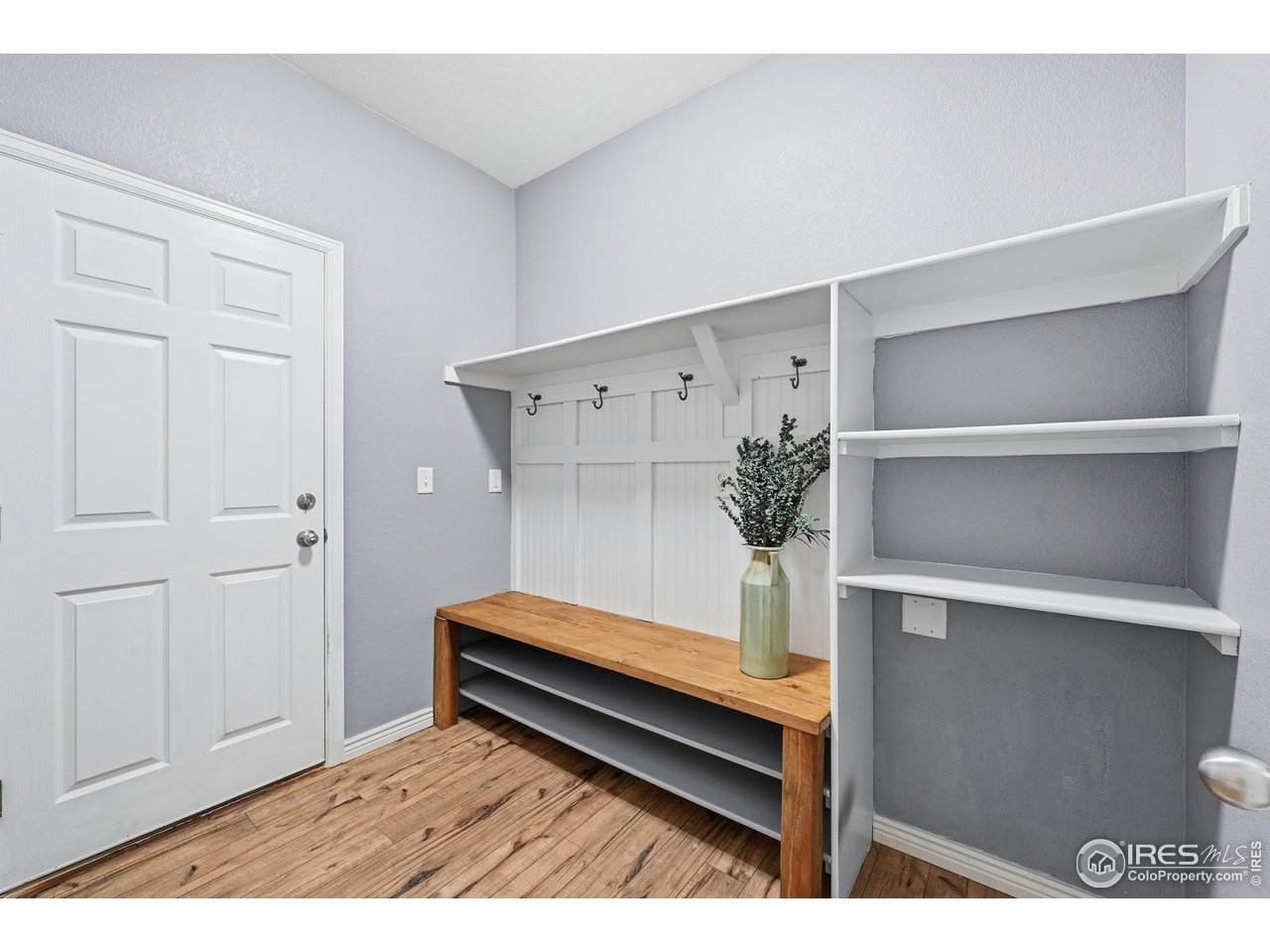1555 Benfleet Court Windsor, CO 80550 - Photo 13 of 41 Mud room to garage