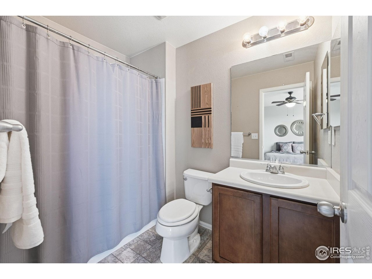 1555 Benfleet Court Windsor, CO 80550 - Photo 23 of 41 Second Bedroom attached bath