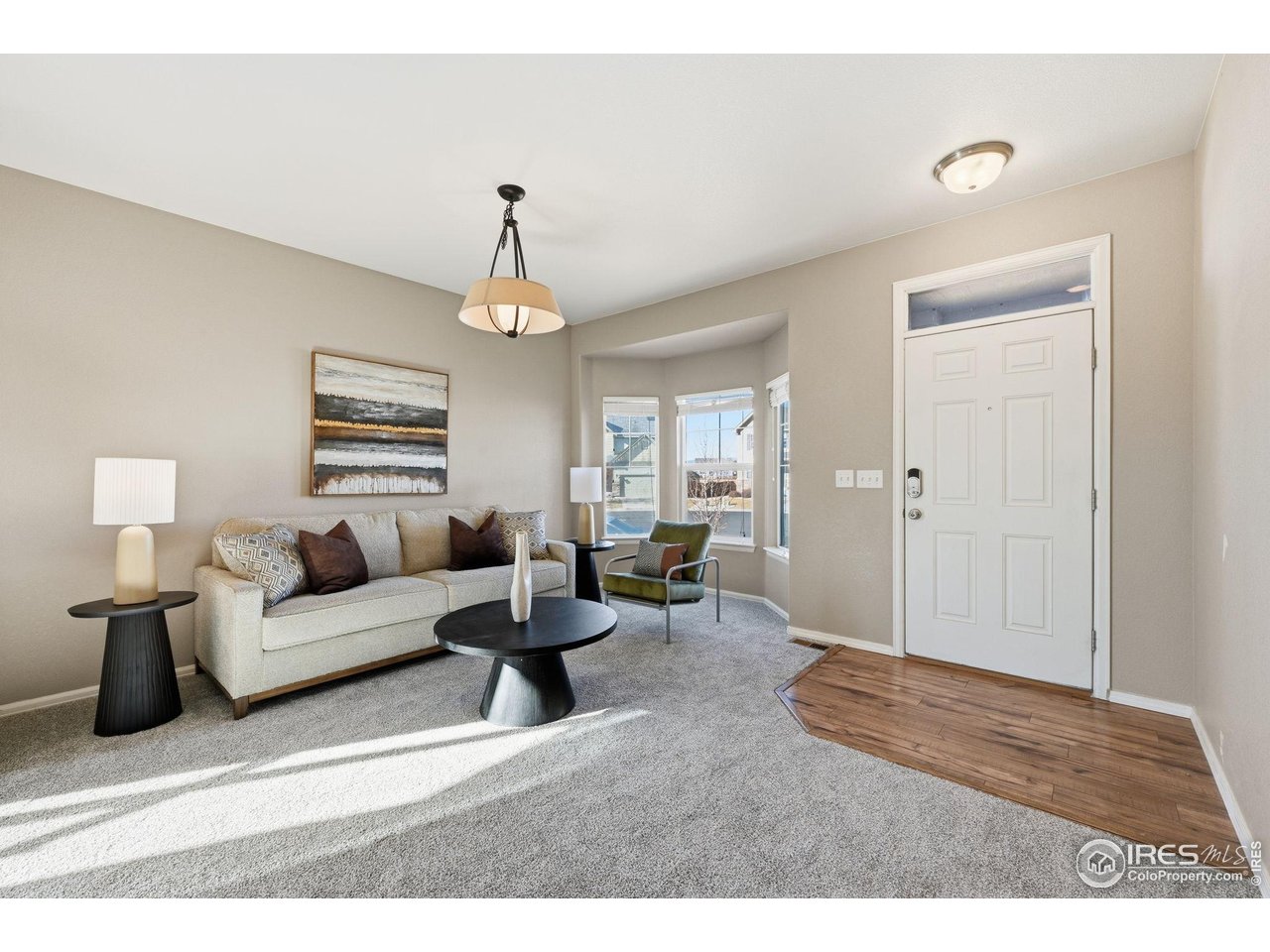 1555 Benfleet Court Windsor, CO 80550 - Photo 3 of 41 Front Living Room