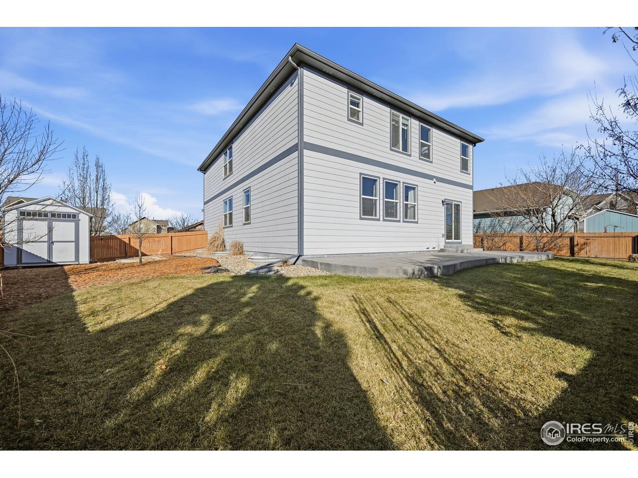 1555 Benfleet Court Windsor, CO 80550 - Photo 32 of 41 Oversized concrete patio