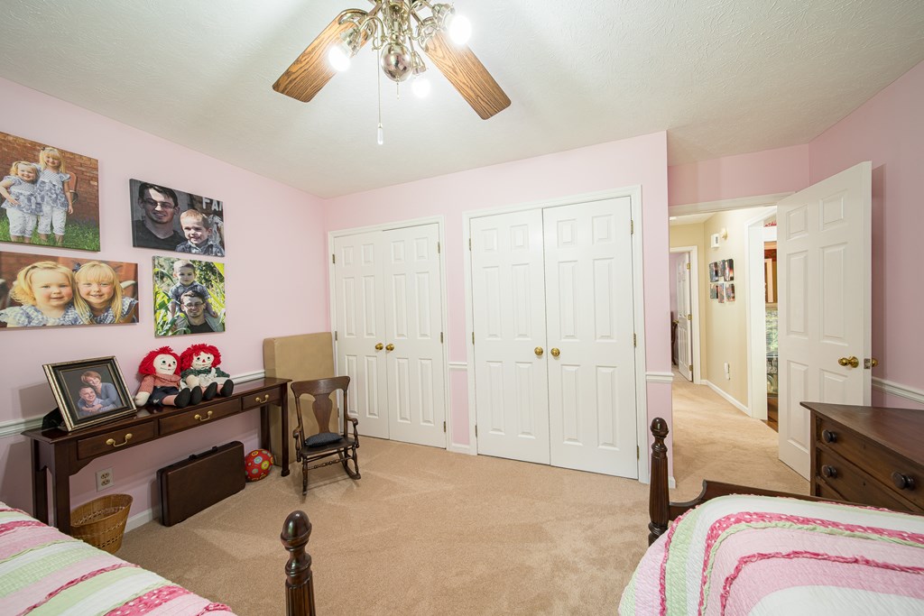 8100 Warm Springs Road Midland, GA 31820 - Photo 20 of 35 a bedroom with furniture and a bed