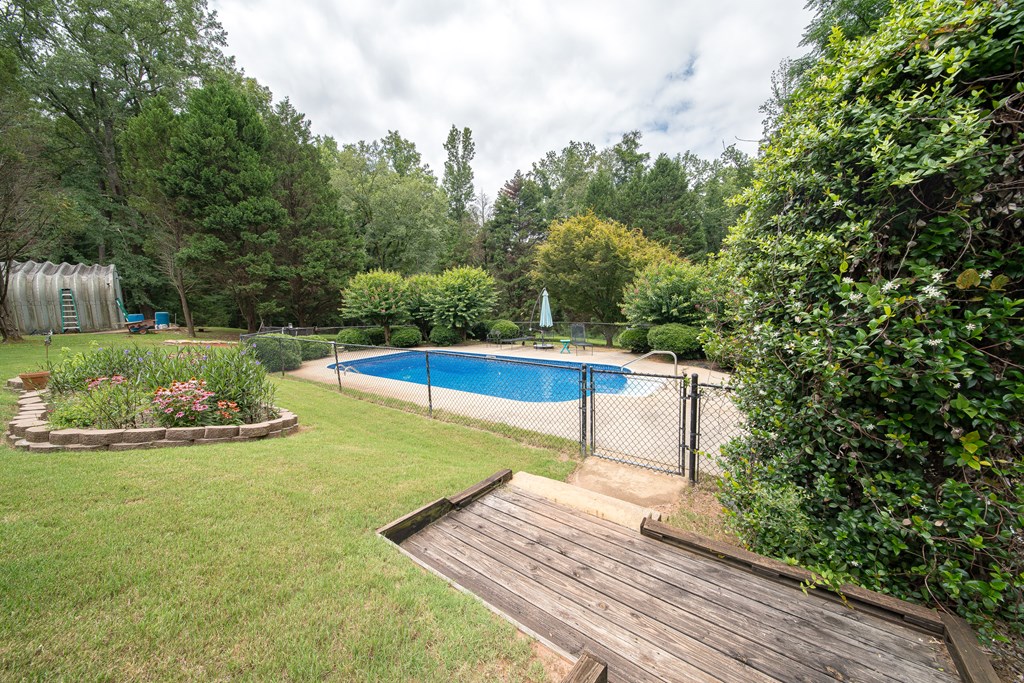 8100 Warm Springs Road Midland, GA 31820 - Photo 26 of 35 a view of a backyard with swimming pool