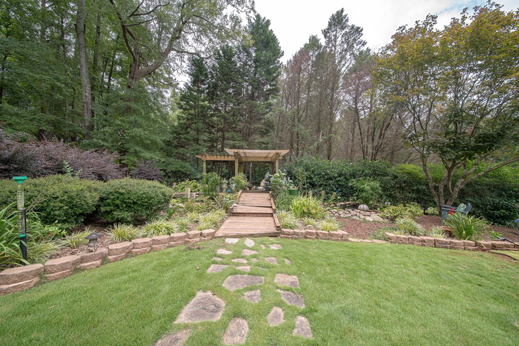 8100 Warm Springs Road Midland, GA 31820 - Photo 27 of 35 a view of a yard with plants and trees