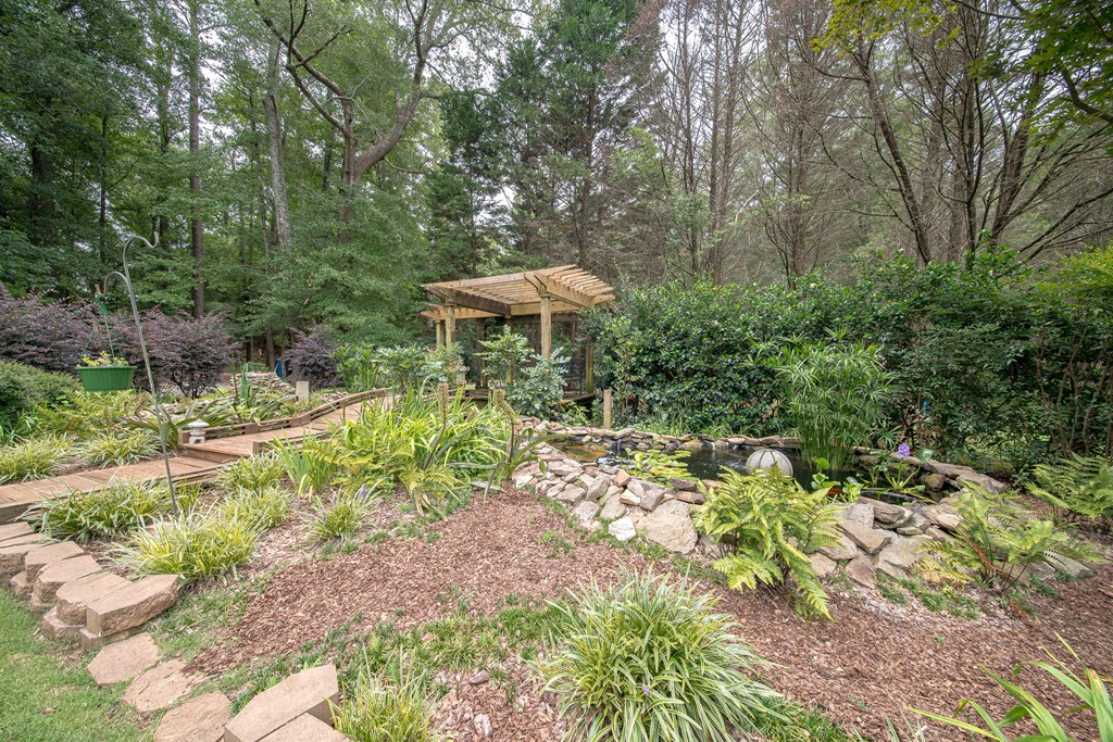 8100 Warm Springs Road Midland, GA 31820 - Photo 28 of 35 a view of a garden with a patio