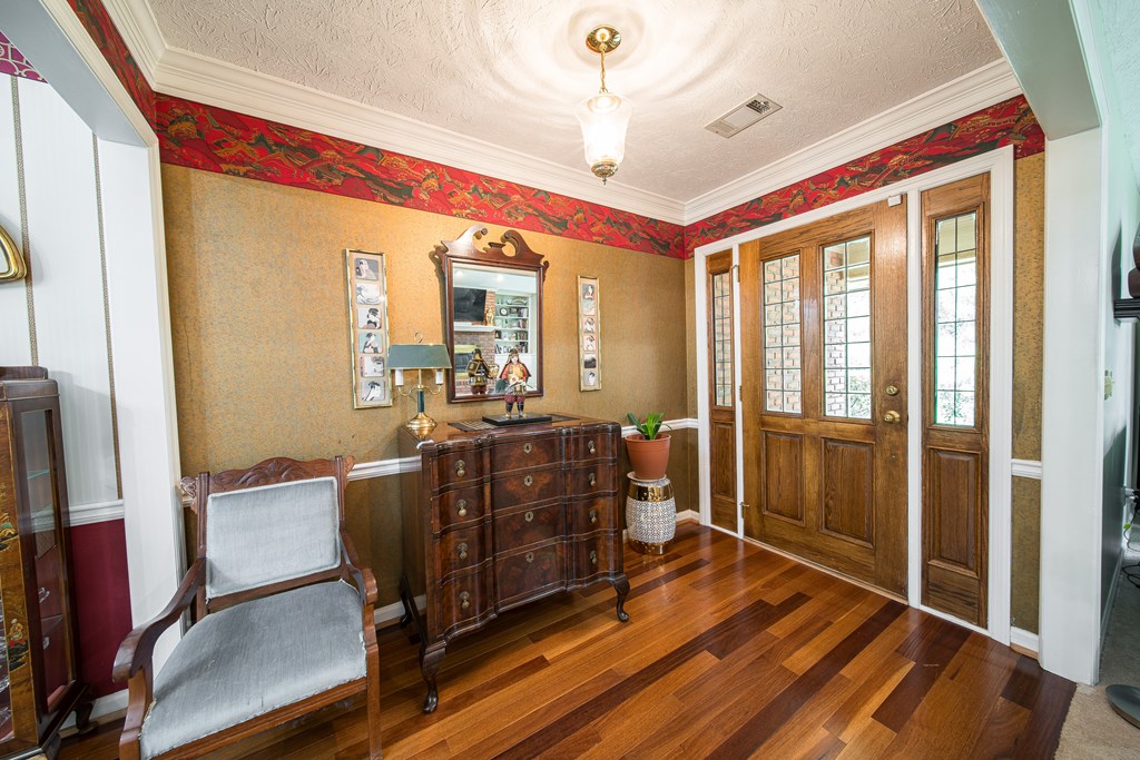 8100 Warm Springs Road Midland, GA 31820 - Photo 3 of 35 a view of a workspace with furniture and a window