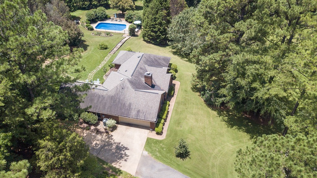 8100 Warm Springs Road Midland, GA 31820 - Photo 34 of 35 an aerial view of a house with a yard and large trees