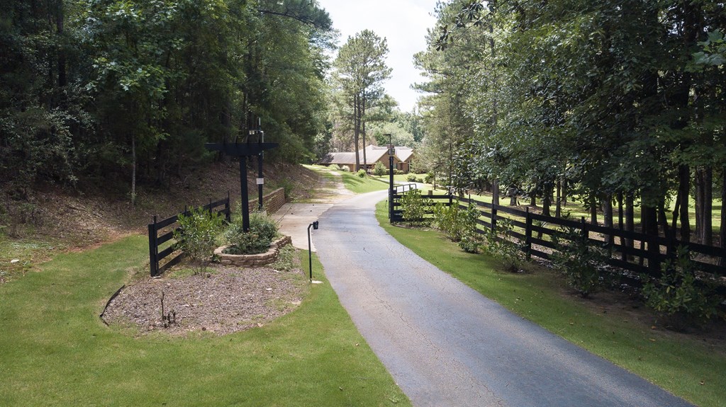 8100 Warm Springs Road Midland, GA 31820 - Photo 35 of 35 a view of a garden with a bench