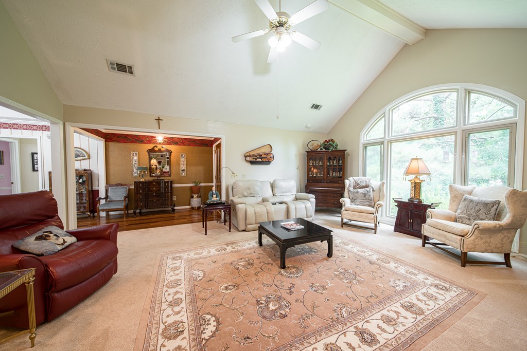 8100 Warm Springs Road Midland, GA 31820 - Photo 5 of 35 a living room with furniture and a large window