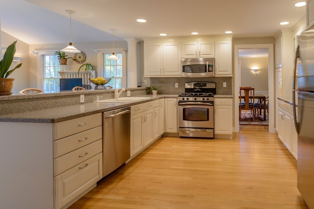 18 Haven Road Wellesley, MA 02481 - Photo 5 of 16 a kitchen with stainless steel appliances granite countertop a stove and a sink