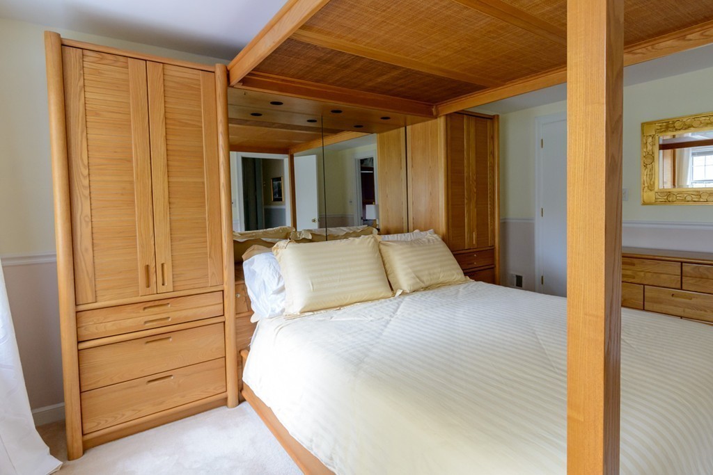 18 Haven Road Wellesley, MA 02481 - Photo 9 of 16 a bedroom with a bed and a dresser