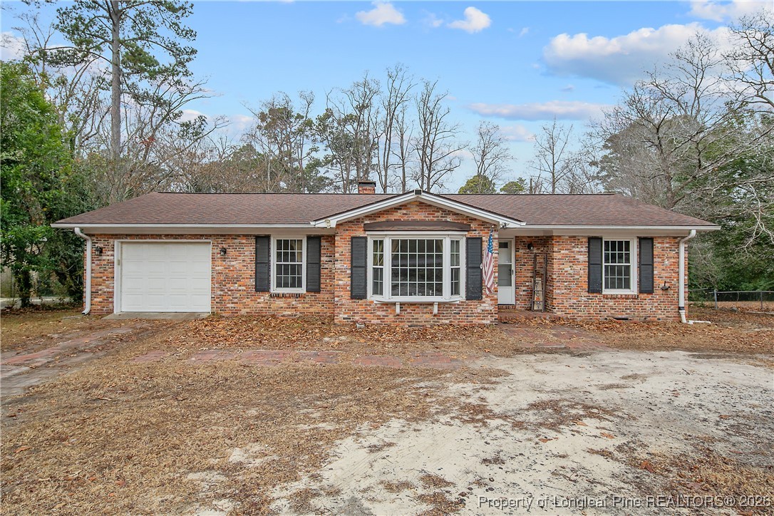 6432 Milford Road Fayetteville, NC 28303 - Photo 1 of 50 front view of a house with a yard