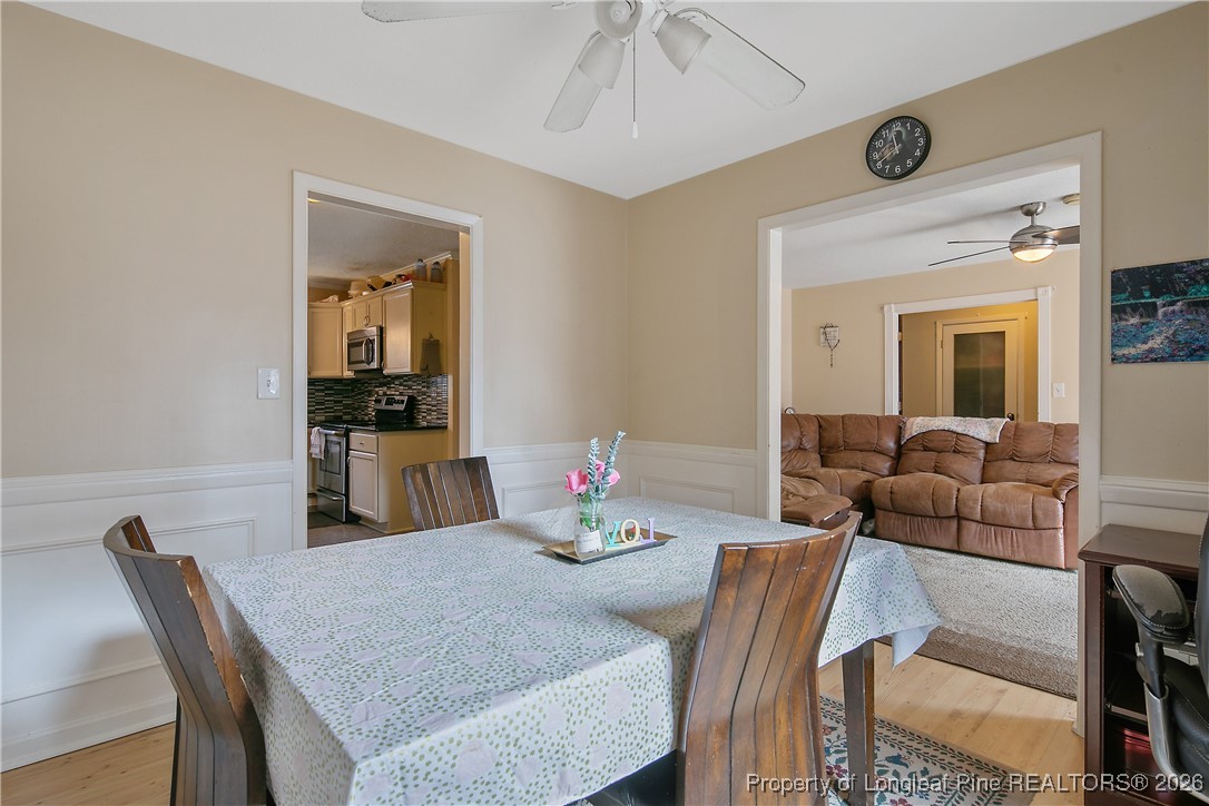 6432 Milford Road Fayetteville, NC 28303 - Photo 13 of 50 a dining room with furniture and window