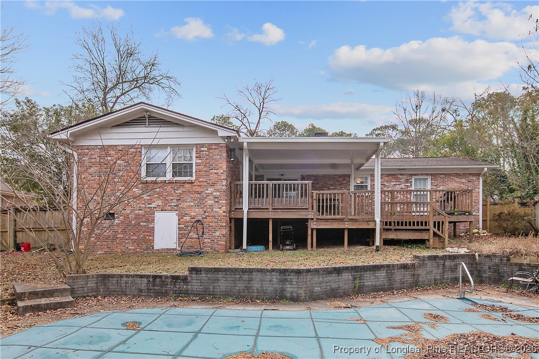 6432 Milford Road Fayetteville, NC 28303 - Photo 42 of 50 a front view of a house with a yard and garage