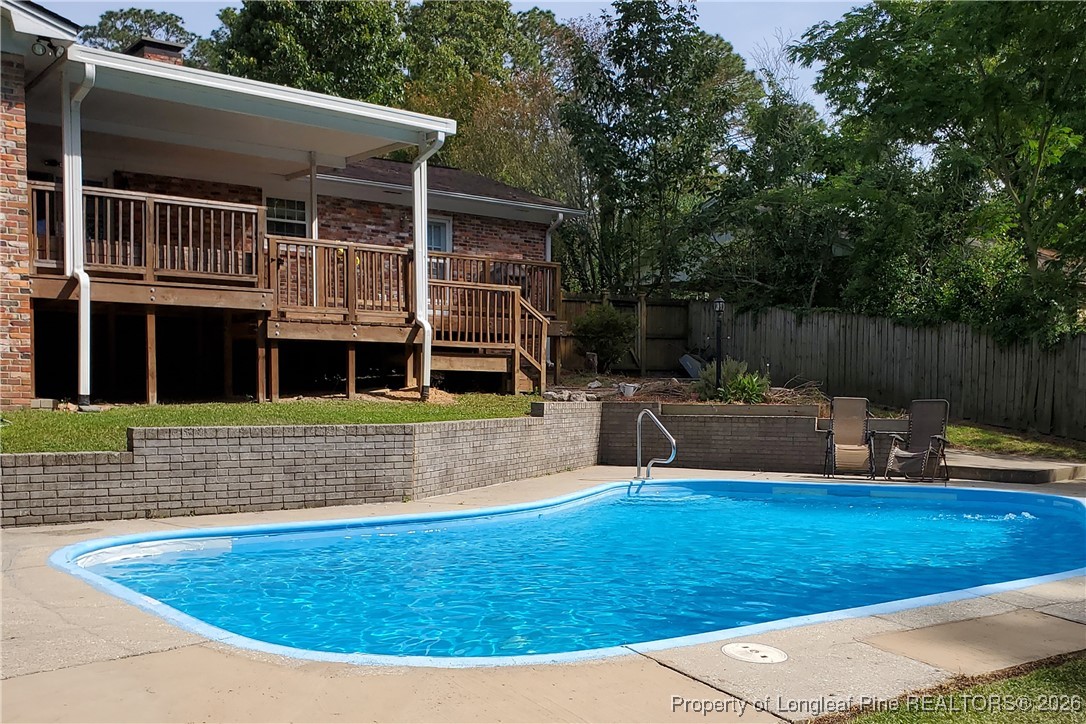 6432 Milford Road Fayetteville, NC 28303 - Photo 47 of 50 a view of outdoor space yard deck and patio