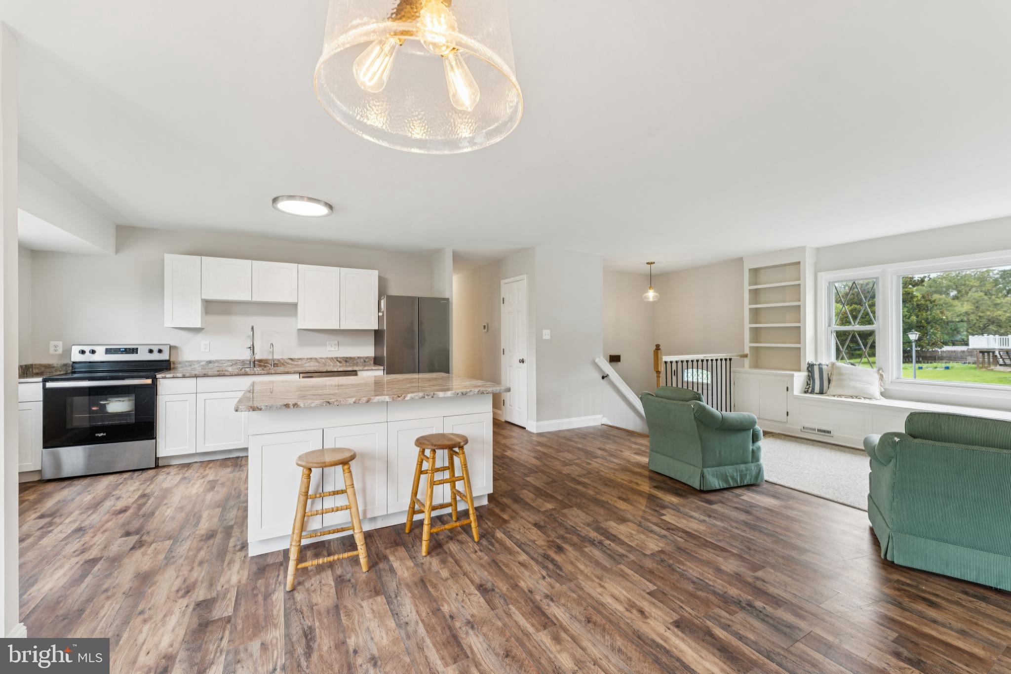 13102 Gerry Road Clinton, MD 20735 - Photo 11 of 40 a large kitchen with a table and chairs