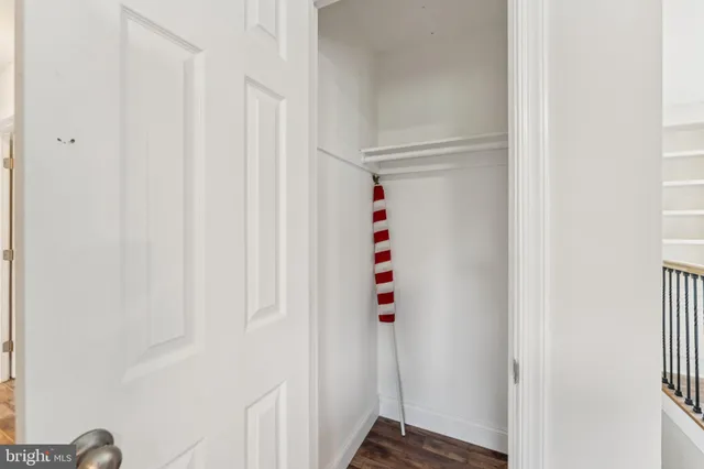 a room that has a closet and a window