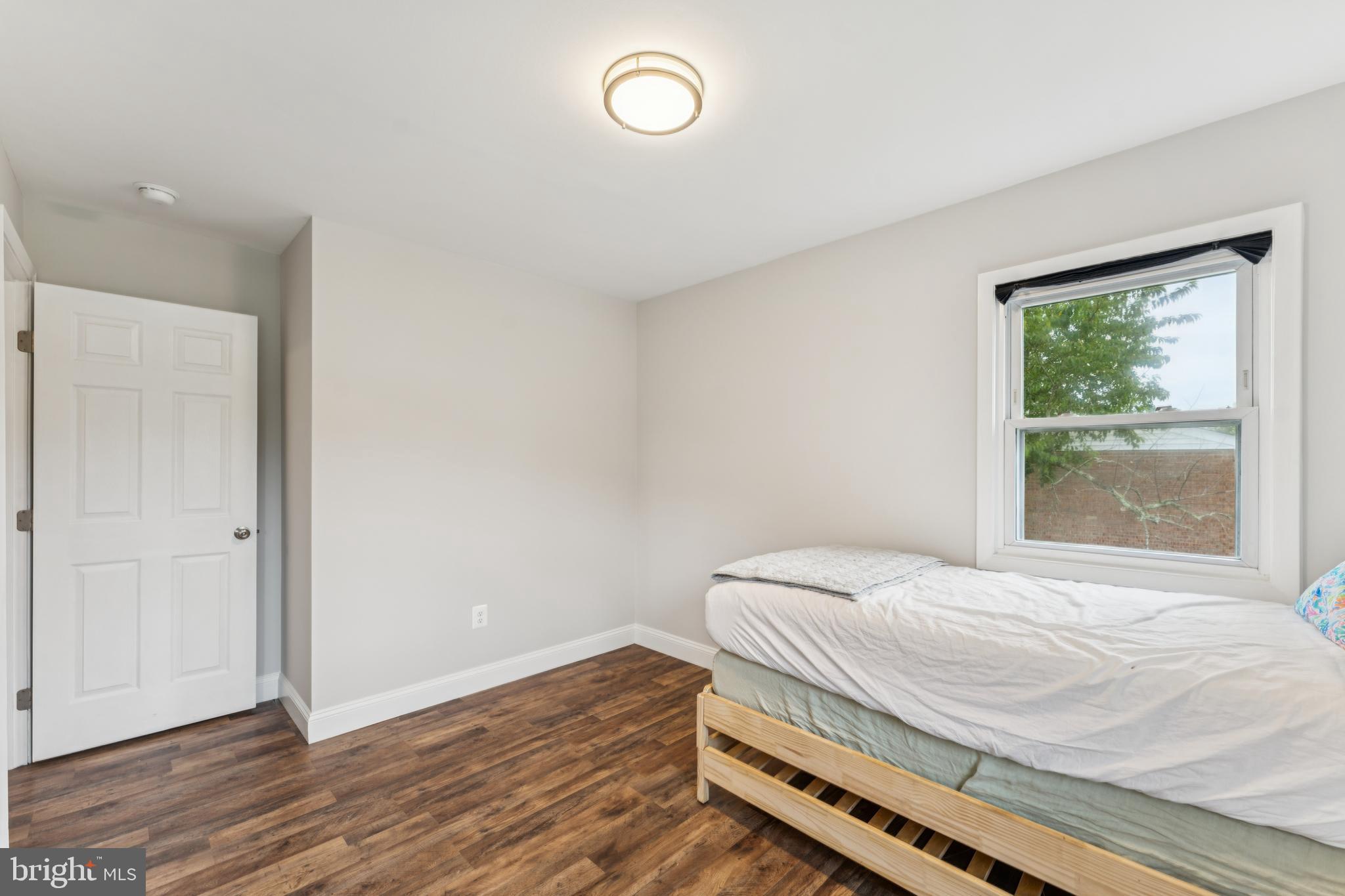 13102 Gerry Road Clinton, MD 20735 - Photo 23 of 40 a bedroom with a bed and a window