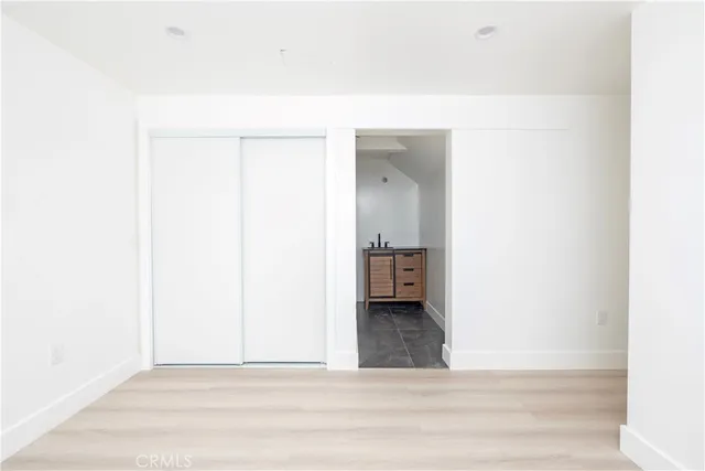 a view of a room with a hallway