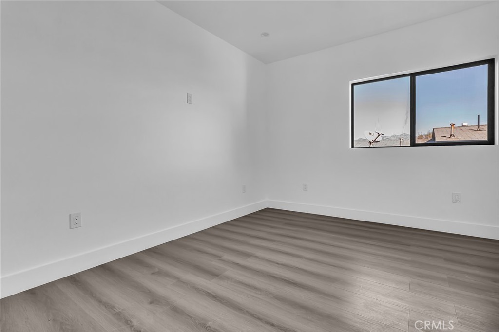1571 Ricardo Street Los Angeles, CA 90033 - Photo 2 of 18 a view of a room with wooden floor
