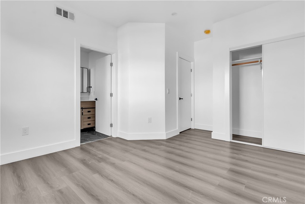 1571 Ricardo Street Los Angeles, CA 90033 - Photo 5 of 18 a view of an empty room and wooden floor