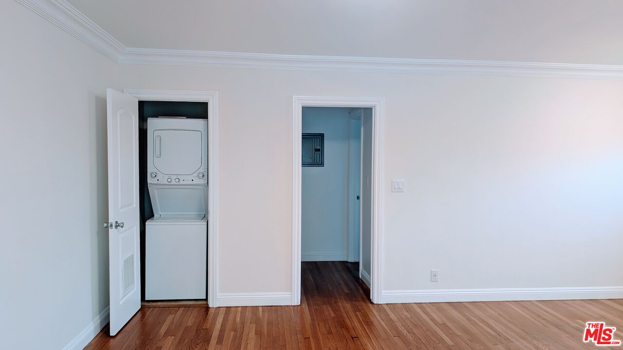 1728 South Robertson Boulevard, Unit 8 Los Angeles, CA 90035 - Photo 3 of 10 a view of a hallway with wooden floor