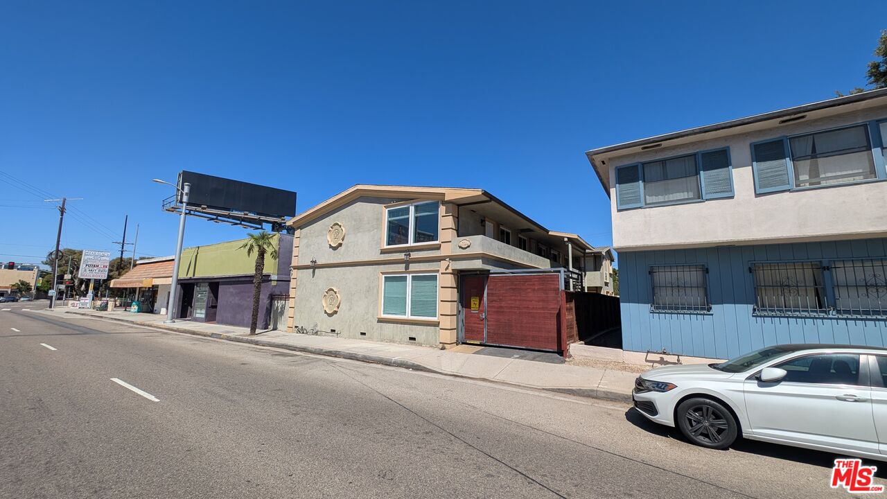 1728 South Robertson Boulevard, Unit 8 Los Angeles, CA 90035 - Photo 10 of 10 a car parked in front of a house