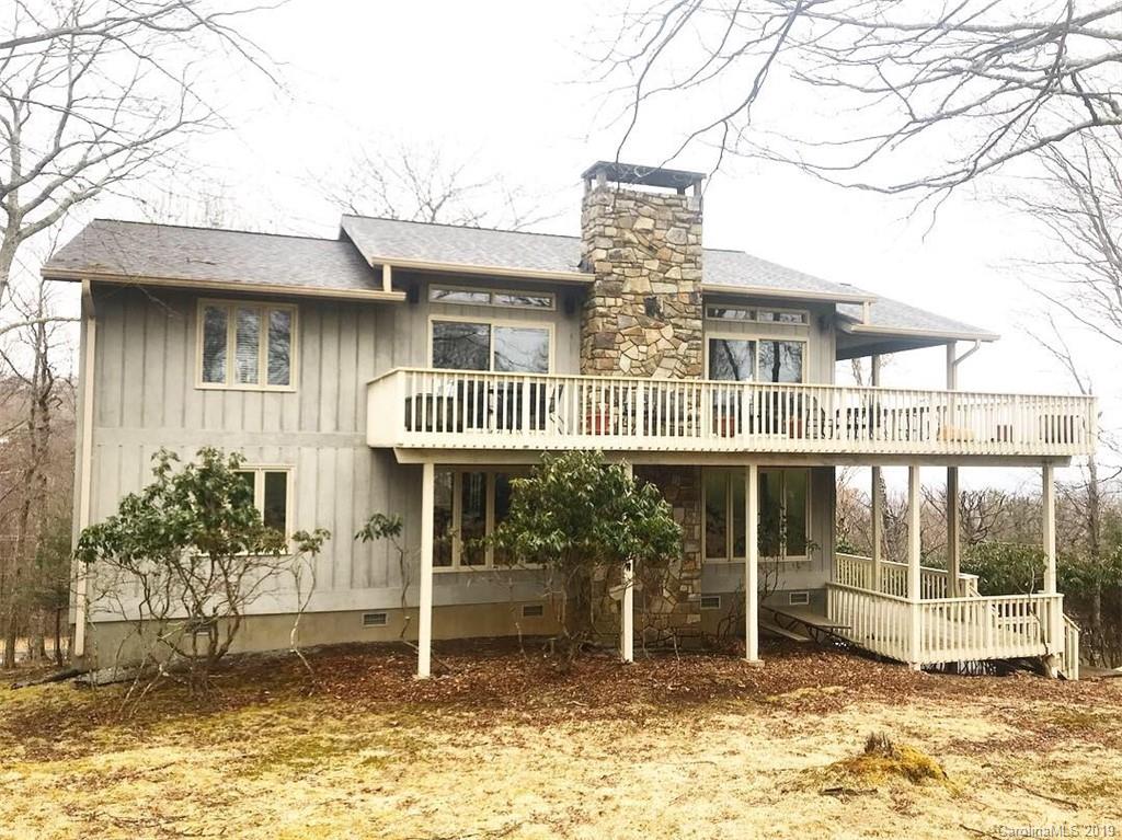 212 Pine Ridge Road Beech Mountain, NC 28604 - Photo 2 of 27 a house view with a outdoor space