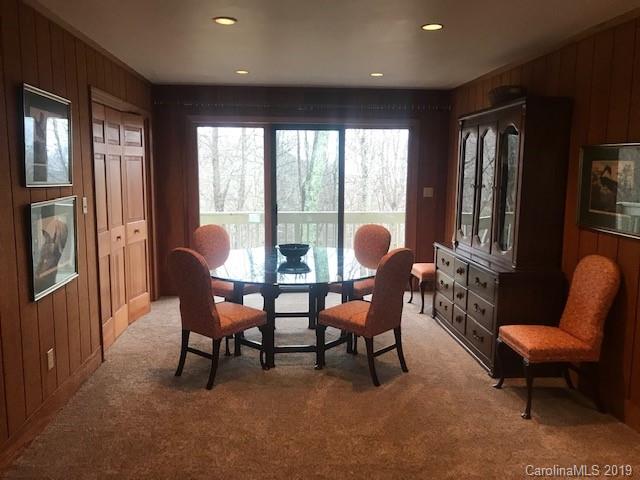 212 Pine Ridge Road Beech Mountain, NC 28604 - Photo 11 of 27 a view of a livingroom with furniture window and outside view